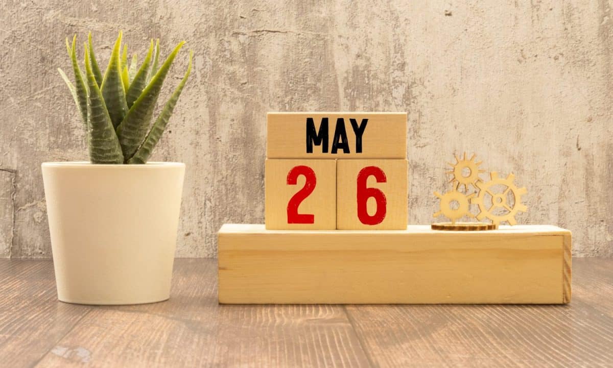 May 26 calendar date text on wooden blocks with blurred nature background. Copy space and calendar concept
