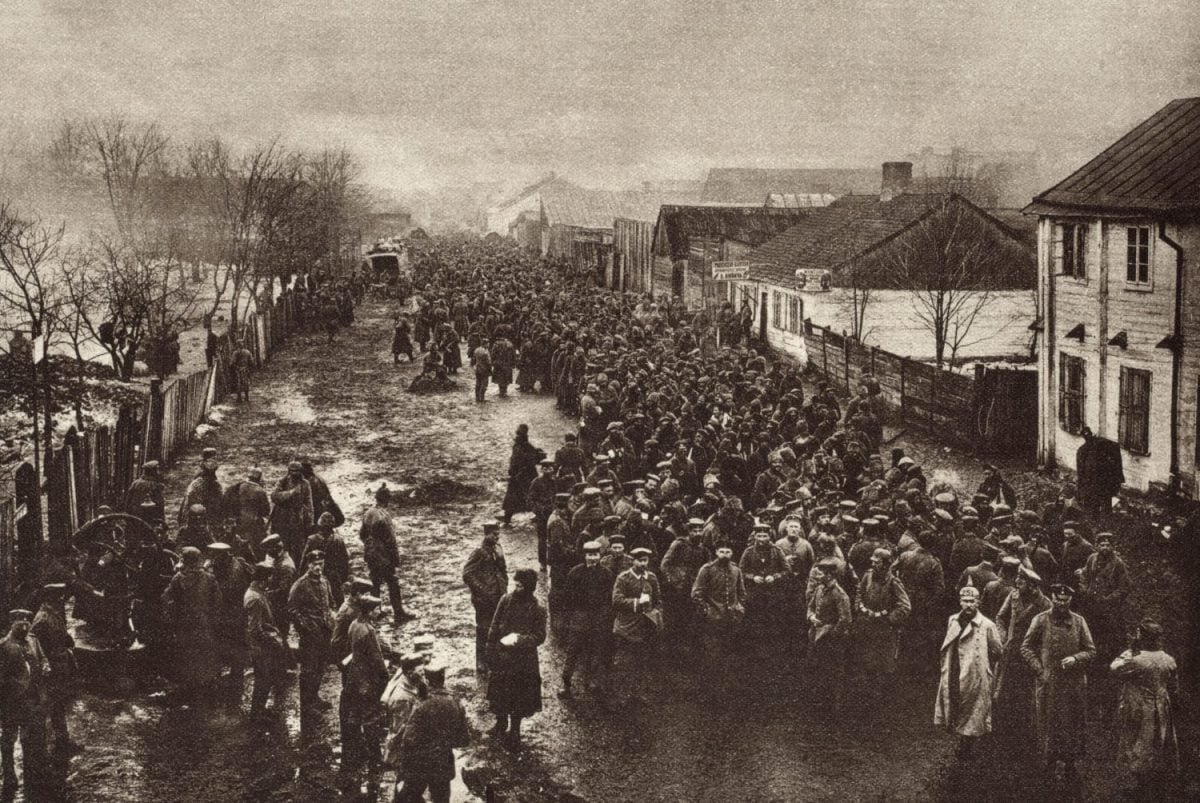 World War 1. Russian soldiers captured by the Germans at Tannenberg passing through a border town on the way to detention camps in Germany.