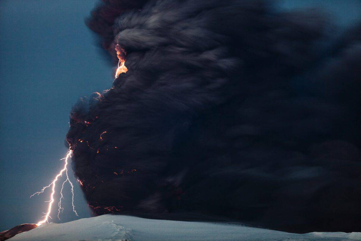 Volcanic lightning. Time-exposure image of lightning in and around a large ash column produced during the 2010 Eyjafjallajokull volcanic eruptions.
