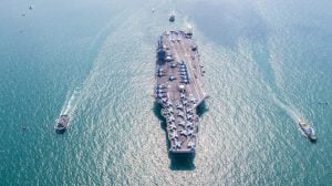 American navy aircraft carrier, USA navy ship carrier full loading airplane fighter jet aircraft, Aerial view army navy nuclear ship carrier full fighter jet aircraft concept technology of battleship.