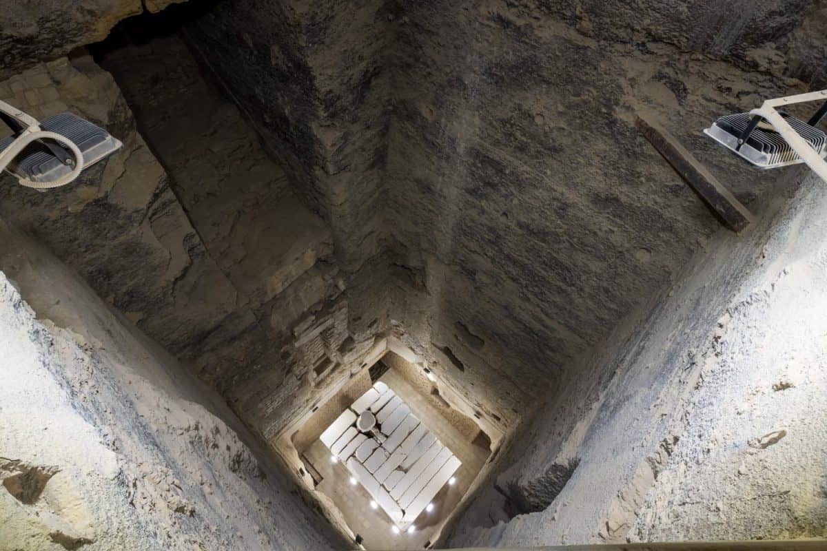 Top view of the burial chamber and sarcophagus of King Djoser inside the Step pyramid of Djoser, a funerary complex (necropolis) in Saqqara, Egypt. Travel and history.