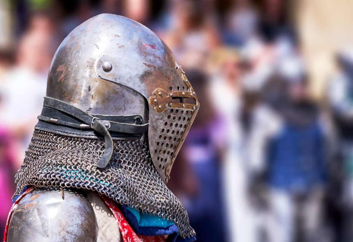 close-up of a medieval knight's helmet, poised for battle
