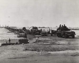 Mulberry harbor developed for the D-Day invasion of Normandy. Installed on Omaha beach after D-Day, the a steel roadway was supported by prefabricated concrete caissons.