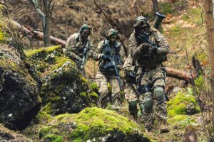 Sneaky guerrilla warfare special task regiment in the jungle . High quality photo