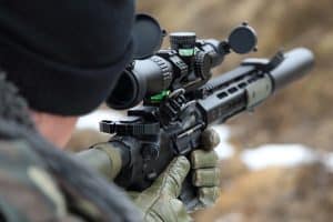 sniper rifle in the hands of a sniper