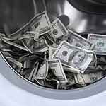 Laundering Fake Money