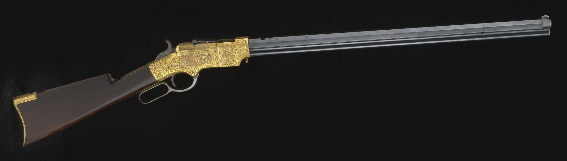 Gold-Inlaid Winchester Rifles