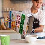 Reading the Back of the Cereal Box at Breakfast