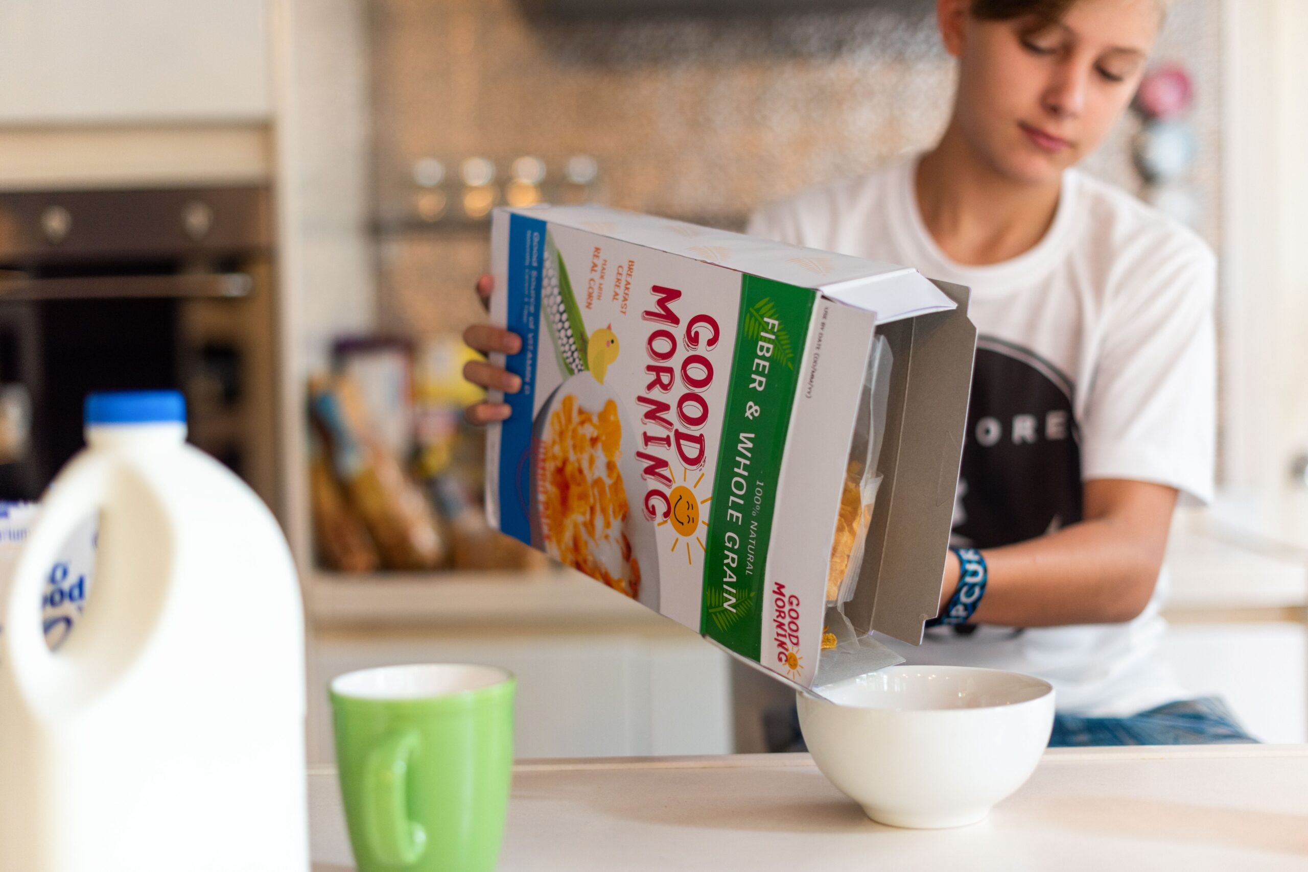 Reading the Back of the Cereal Box at Breakfast