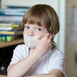 Covering the Mouth With Tape