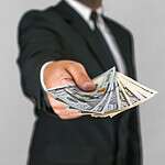 Slipping someone a cash bonus on the spot
