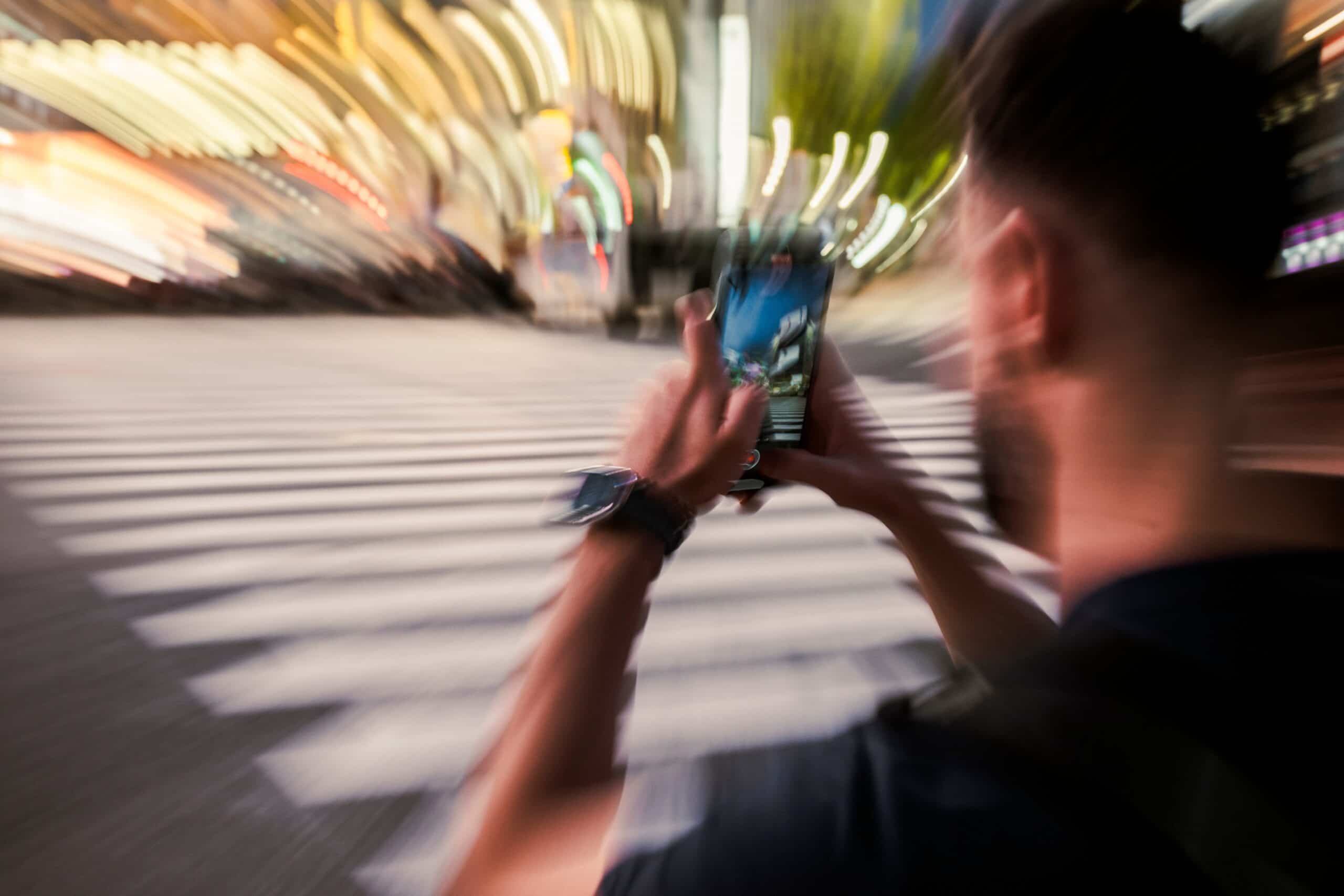 Honolulu, Hawaii: Looking at Your Phone While Crossing the Street